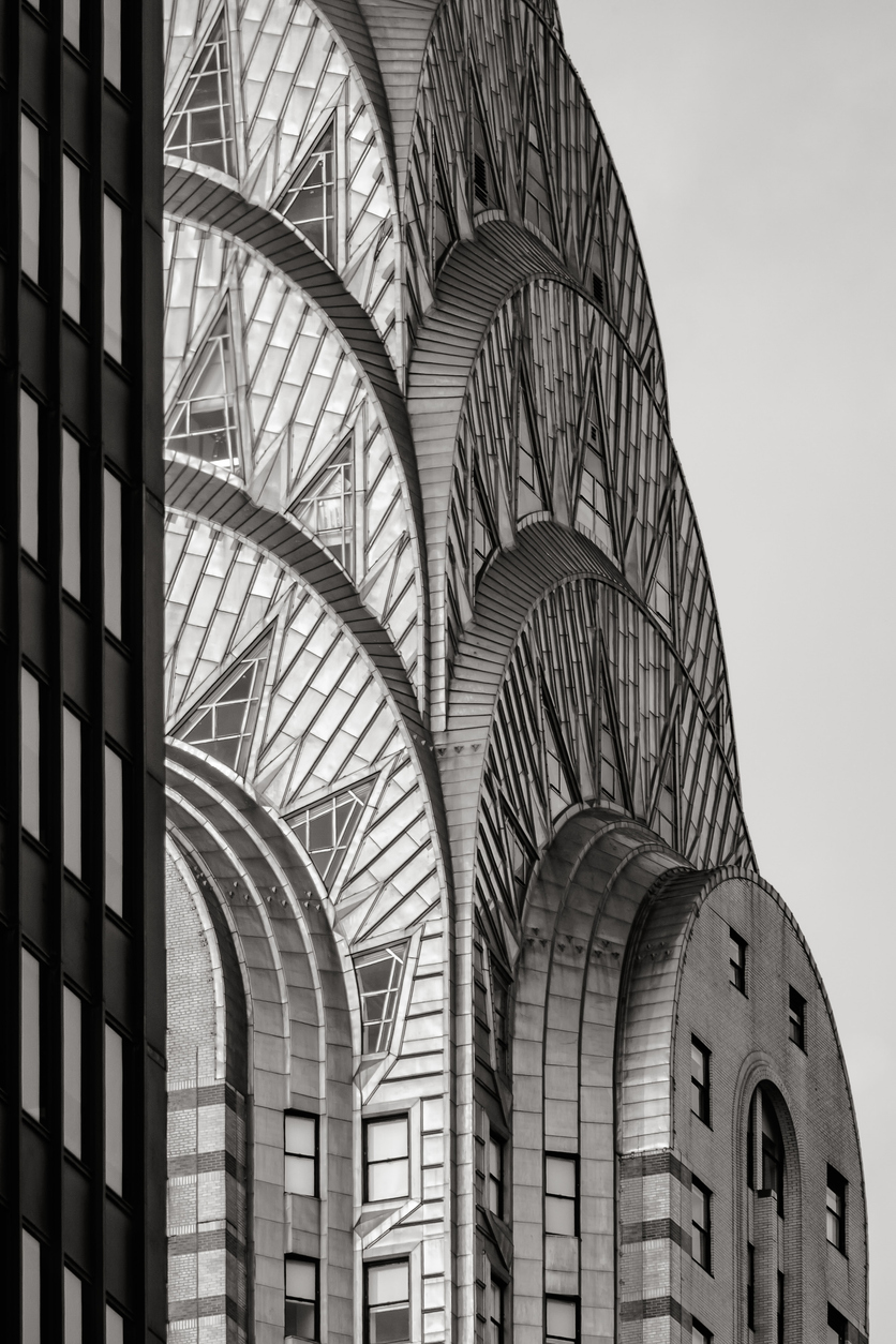 Stainless steel detail of top of the Chrysler Building (Art Deco style – National Historic Lanmark) in Black & White. Midtown, Manhattan
